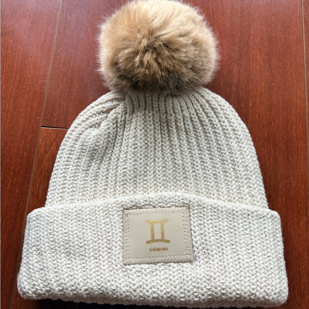 Love Your Melon Gemini Cream Knit Beanie with Tan Pom